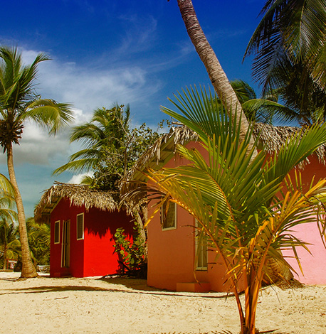 image of huts on tropical beach in Nassau Bahamas