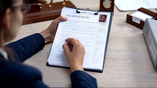 image of woman filling out Visa application