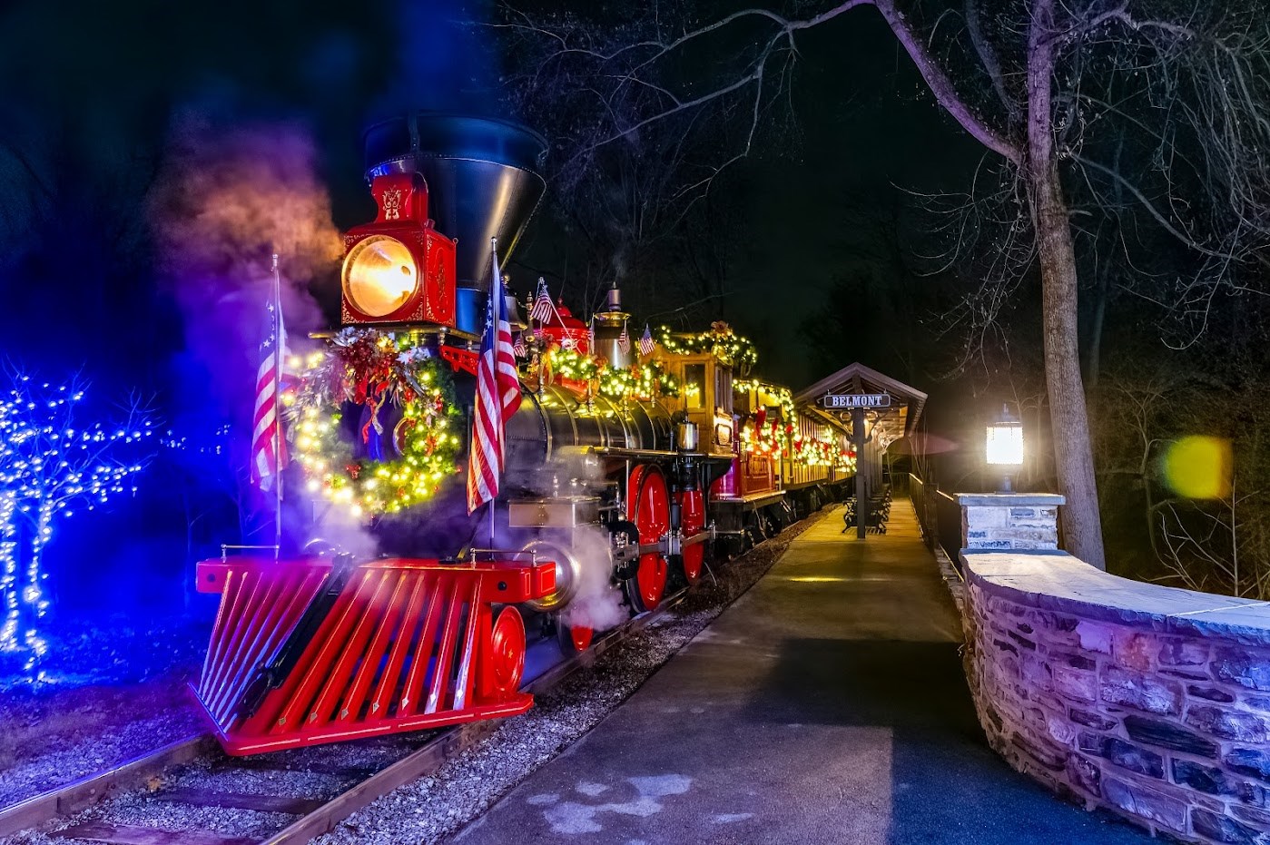 image of Christmas-decorated train at Stone Gables Estate