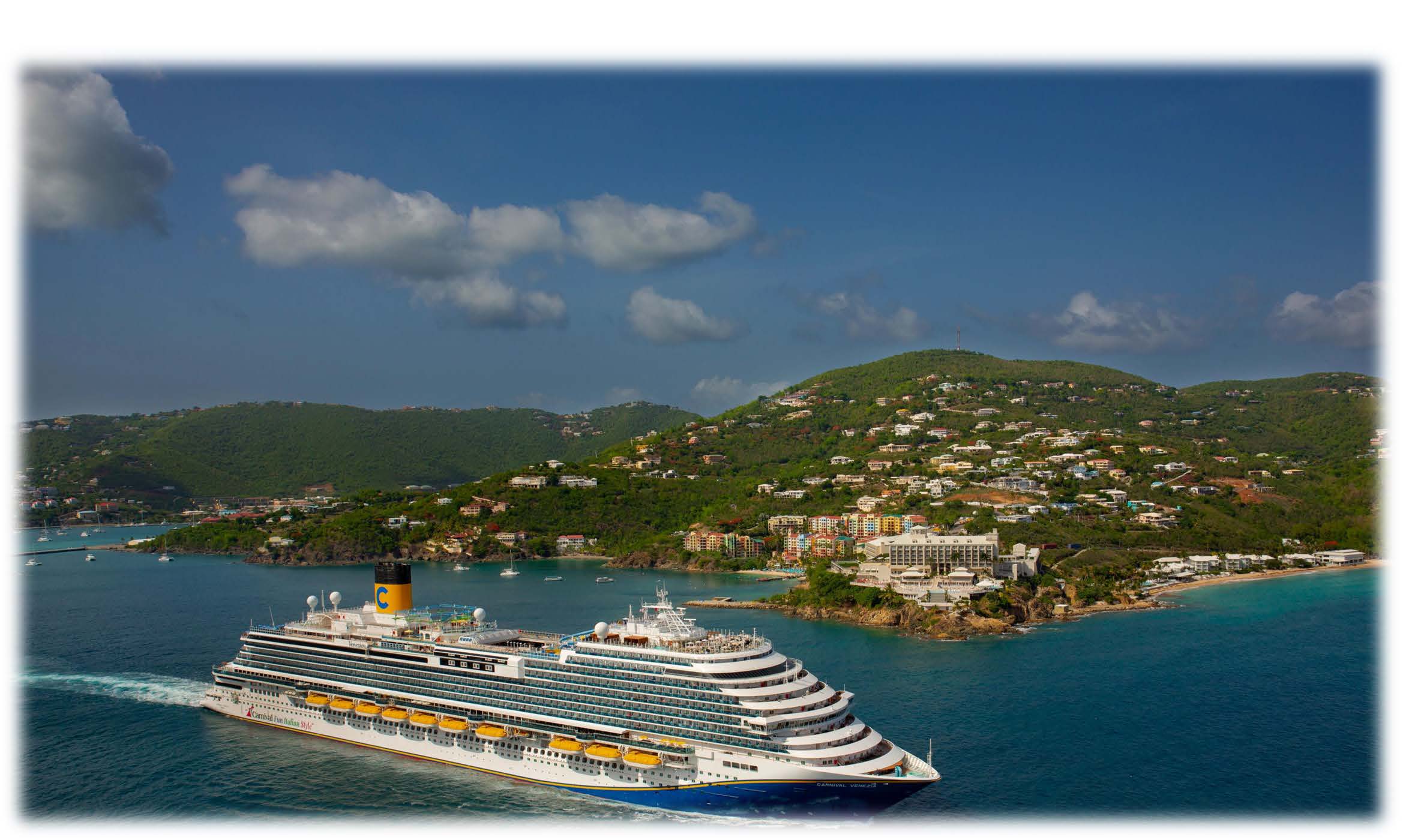 image of Carnival cruise ship with mountain range in the background