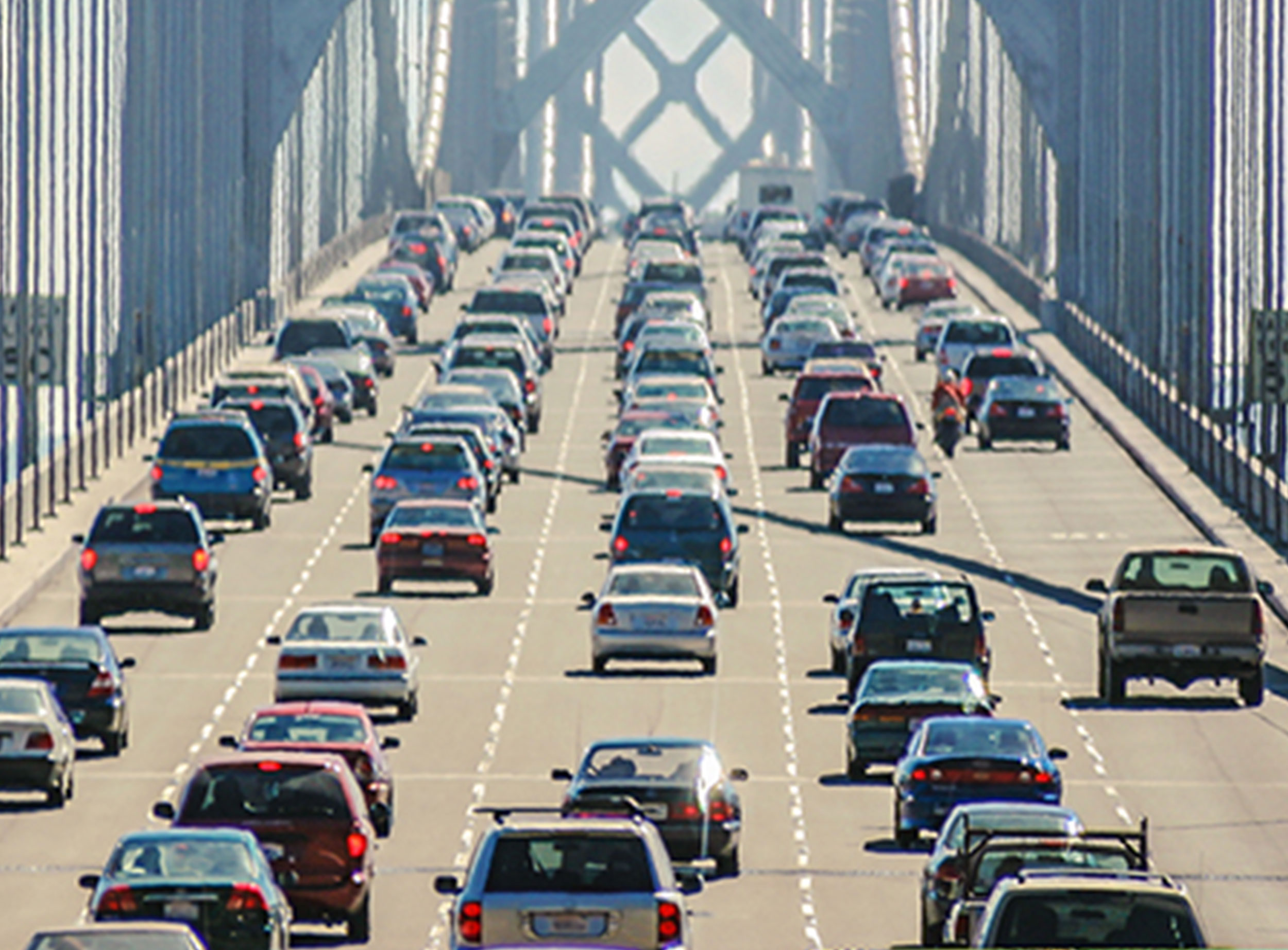 image of vehicles crossing over large bridge