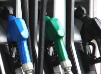 image of blue, green and black gas pumps