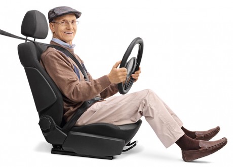 image of elderly man pretending to drive