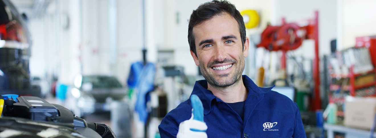 banner image of guy working in shop