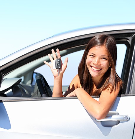 image of teen driver holding keys